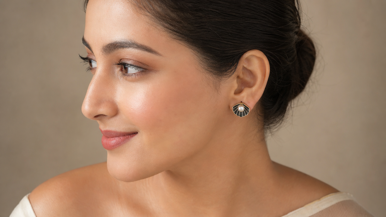 Shell pearl-stud in Multicolour earrings by Buddhu, worn by a model