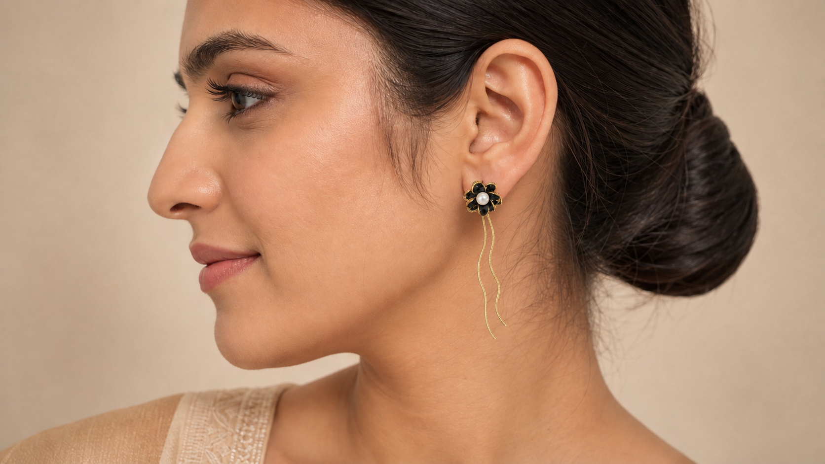 Thread drop Pearl galaxy in Black earrings by Buddhu, worn by a model